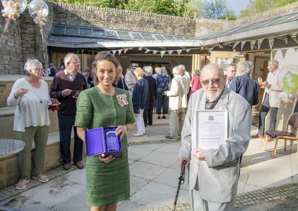 Lord Lieutenant for North Yorkshire, Jo Ropner presents 98 year old volunteer Cyril Wilkinson the Queen's Award for Voluntary Service to the Washburn Heritage Centre,  the highest award given to local volunteer groups across the UK. Cyril bakes flapjack and makes coleslaw for the tearoom.  Picture Tony Johnson