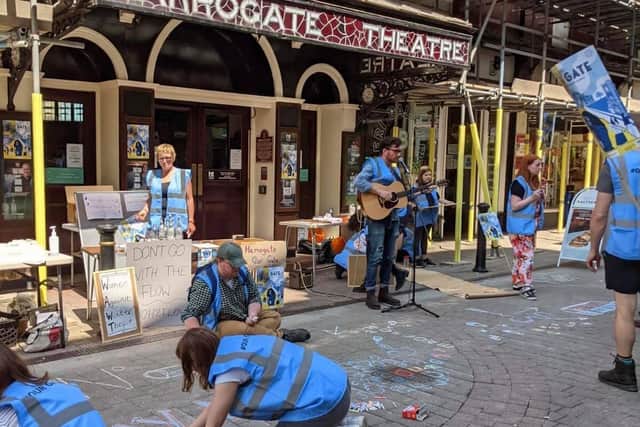 Rufus Beckett of top local band The Paper Waits sang outside Harrogate Theatre at the weekend as part of a sneak preview of Our Gate on Oxford Street as shoppers looked on.