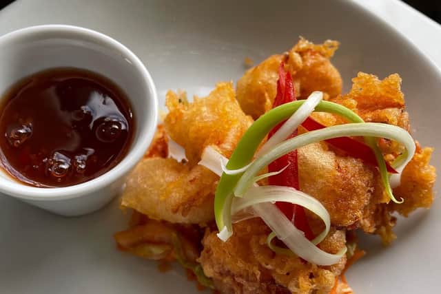 Tempura king prawns with kimchi slaw and sweet chilli dipping sauce.