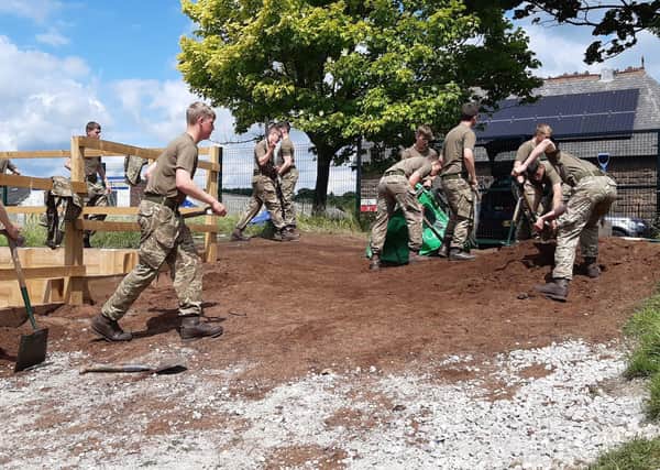 Soldiers from 14 Platoon P-Coy of the Army Foundation College helped to create raised beds, using topsoil donated by Arkendale landscape supplies firm Green-tech, for a community allotment at

 

New Park Primary Academy in Harrogate.