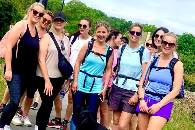 Despite blistered feet and feeling tired, the women are determined to take on the challenge of walking 26 miles to raise the much-needed funds.