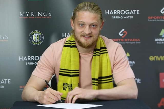 Luke Armstrong has joined the Sulphurites from League Two rivals Salford City.