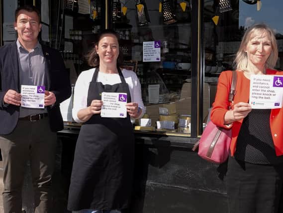 Supporting Disability Action Yorkshire - Harrogate BID Manager, Matthew Chapman; The Cheeseboard owner, Gemma Aykroyd; and Disability Action Yorkshire Chief Executive, Jackie Snape.