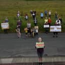 Kingsley protesters, including Catherine Maguire, front, gather at the planned site o the latest new housing development near Kingsley Drive in Harrogate. (Picture Gerard Binks)