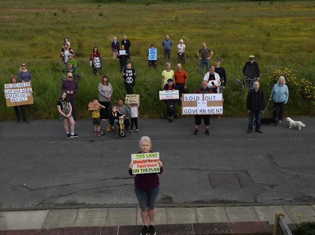 Kingsley protesters, including Catherine Maguire, front, gather at the planned site o the latest new housing development near Kingsley Drive in Harrogate. (Picture Gerard Binks)
