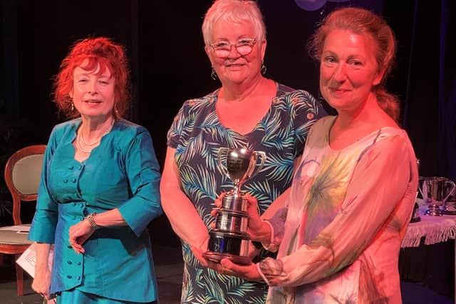 Alison Gilmour (Woodlands Drama Group) receiving the best producer award.