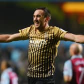 Rory McArdle celebrates Bradford City's 2013 League Cup giant-killing of Aston Villa. Pictures: Getty Images