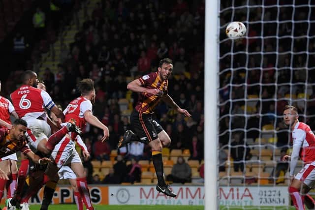 Rory McArdle heads home Bradford City's winner during a League One play-off semi-final clash with Fleetwood Town in 2017.