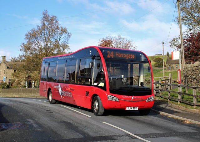 An Optare electric bus operated by the Harrogate Bus Company.