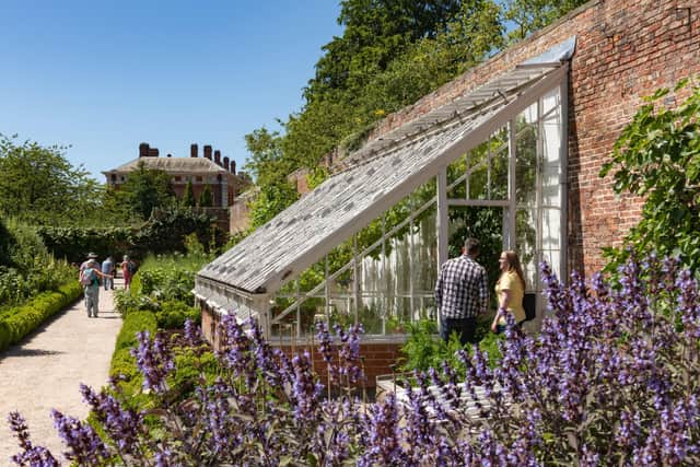Visitors in the Walled Garden at Beningbrough Hall and Gardens, North Yorkshire