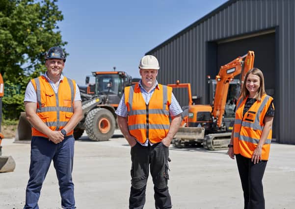 Construction manager John Royle and Jenna Strover, head of commercial delivery at Potter Space, with (middle) Matthew Robinson of customer Recycled Asphalt Products (RAP). PHOTO: Adrian Ray Photography Ltd.