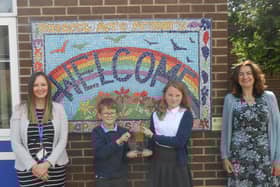 Accolade for Rossett Acre Primary School - Michelle Williams,  Financial Education Leader; pupil Felix Smith - Year 5; pupil Evie Mason - Year 5 and headteacher Corrine Penhale.