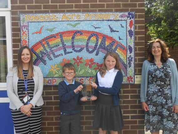 Accolade for Rossett Acre Primary School - Michelle Williams,  Financial Education Leader; pupil Felix Smith - Year 5; pupil Evie Mason - Year 5 and headteacher Corrine Penhale.