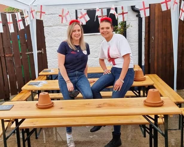 C'mon England - Harrogate bar The Tap at Tower Street staff members Caitlin Labonte and Sophie McGeever before the England v Italy match.
