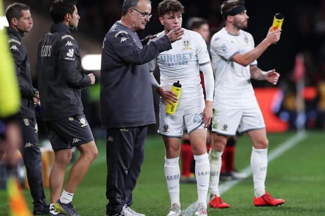 Jordan Stevens receives instructions from Leeds United head coach Marcelo Bielsa during a pre-season friendly in the summer of 2020. Picture: Getty Images