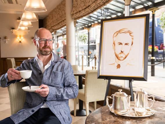 Harrogate artist Christian Alexander Bailey with his new portrait of Gareth Southgate. (Photograph by Simon Dewhurst)