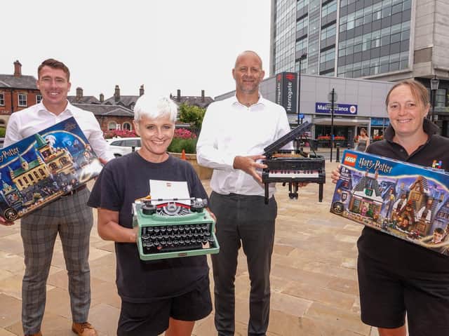 New Lego trail - Harrogate BID Manager Matthew Chapman, Harrogate BID Host Jo Caswell, Victoria Shopping Centre Manager James White, and Harrogate BID Host Sara Hartley.