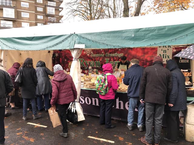 Flashback to Harrogate Christmas Market during normal times and crowds at Ryan Jepson Cheeses.