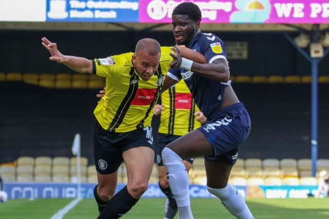 Aaron Martin fights for possession at Roots Hall.