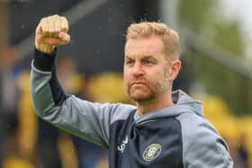 Simon Weaver salutes the Harrogate Town supporters following Saturday's 3-2 victory over Rochdale. Pictures: Matt Kirkham