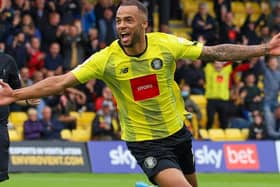 Warren Burrell celebrates his 91st-minute winner against Rochdale. Pictures: Matt Kirkham
