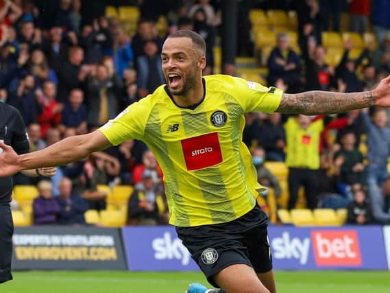 Warren Burrell celebrates his 91st-minute winner against Rochdale. Pictures: Matt Kirkham