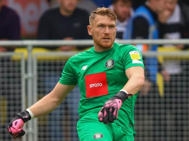 Harrogate Town goalkeeper Mark Oxley in action against Rochdale. Picture: Matt Kirkham