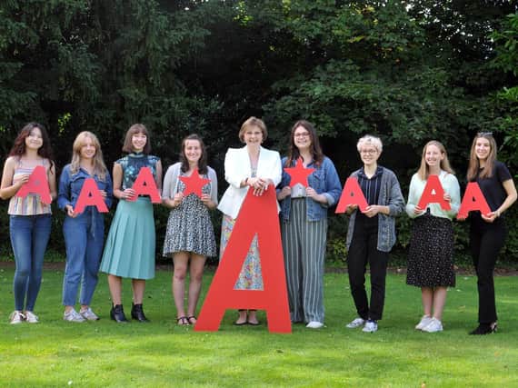 Sylvia Brett, principal of Harrogate Ladies College (centre), pictured with top performing A-Level students.