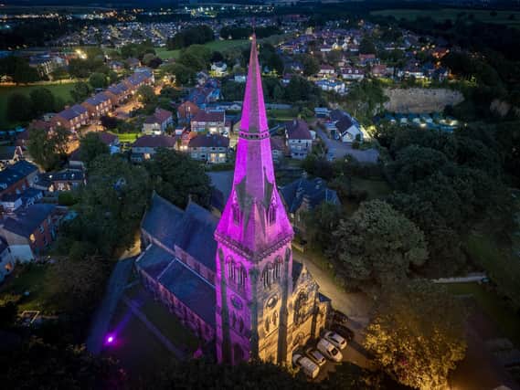 FEAV highlight - The stunning pink/purple lighting at Holy Trinity Church in Knaresborough. (Picture by Richard Maude)