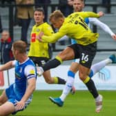 Alex Pattison blasts home Harrogate Town's winning goal in the 81st minute of Saturday's League Two win over Barrow. Pictures: Matt Kirkham