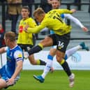Alex Pattison blasts home Harrogate Town's winning goal in the 81st minute of Saturday's League Two win over Barrow. Pictures: Matt Kirkham