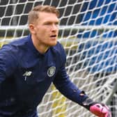 Mark Oxley warms up ahead of Harrogate Town's League Two victory over Barrow. Pictures: Matt Kirkham