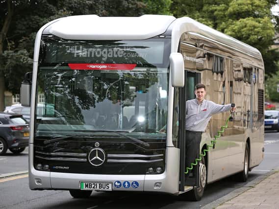 Driver Brandon Hopper with the Mercedes-Benz E-Citaro zero-emission electric bus, which has completed trials this week with The Harrogate Bus Company.