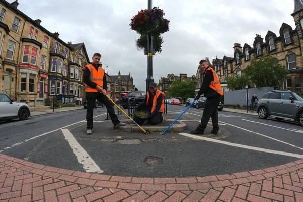 Harrogate BID team's hard at work tidying things in the town centre.