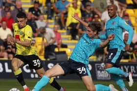 Harrogate Town substitute Simon Power runs at the Exeter City defence. Pictures: Harrogate Town AFC