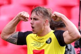 Jack Diamond celebrates after putting Harrogate Town 3-1 up against Notts County in the 2019/20 National League play-off final at Wembley. Pictures: Getty Images