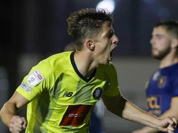 Harrogate Town striker Danilo Orsi celebrates his second goal against Mansfield Town. Picture: Matt Kirkham