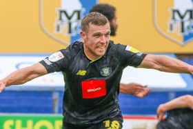 Jack Muldoon celebrates after putting Harrogate Town 2-1 up against Mansfield Town on the stroke of half-time. Pictures: Matt Kirkham