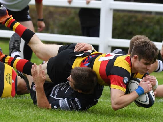Jack Haydock touches down during Harrogate RUFC's home defeat to Sedgley Park. Pictures: Gerard Binks