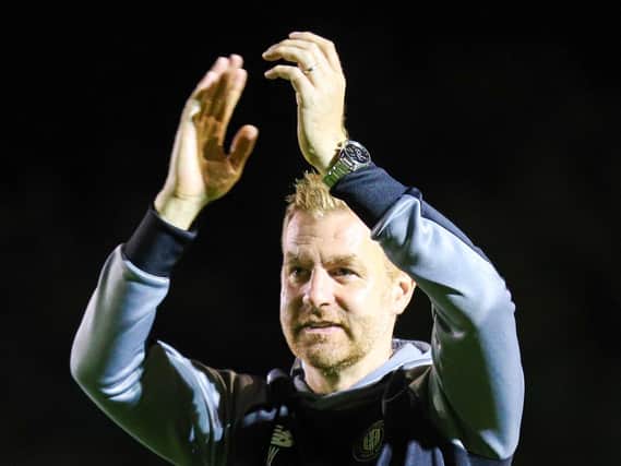 Simon Weaver applauds Harrogate Town's supporters following Friday's 2-2 League Two draw with Newport County. Pictures: Matt Kirkham