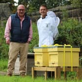 New bee hives - Harrogate Borough Council's cabinet member for environment Coun Andrew Paraskos with beekeeper Terence Edmondson.
