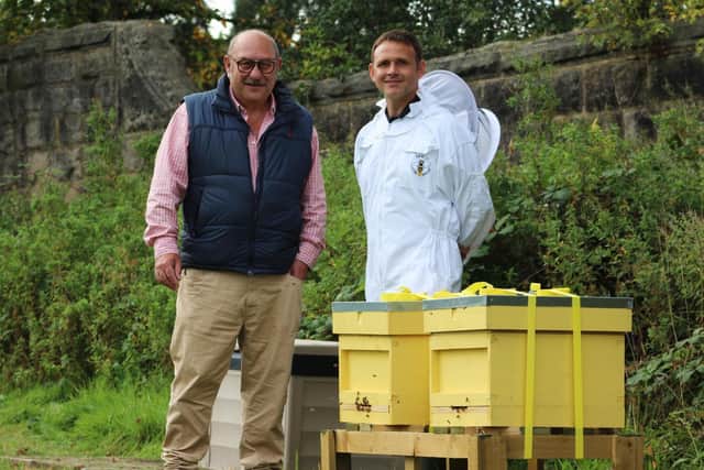 New bee hives - Harrogate Borough Council's cabinet member for environment Coun Andrew Paraskos with beekeeper Terence Edmondson.