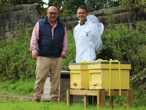 New bee hives - Harrogate Borough Council's cabinet member for environment Coun Andrew Paraskos with beekeeper Terence Edmondson.