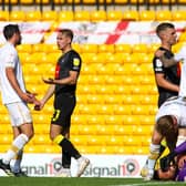Harrogate Town winger Jack Diamond, second from left, leaves the field having been shown a second yellow card by referee Andrew Kitchen following a challenge on Port Vale goalkeeper Lucas Covolan. Pictures: Matt Kirkham