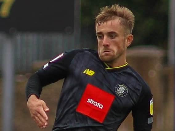Harrogate Town midfielder Alex Pattison suffered a head injury against Port Vale. Pictures: Matt Kirkham