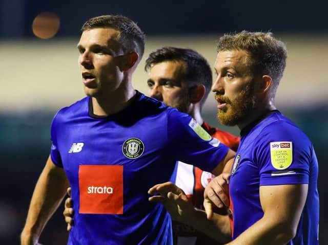 Jack Muldoon, left, and George Thomson both chipped in with assists as Harrogate Town drew 2-2 at Crawley. Pictures: Matt Kirkham