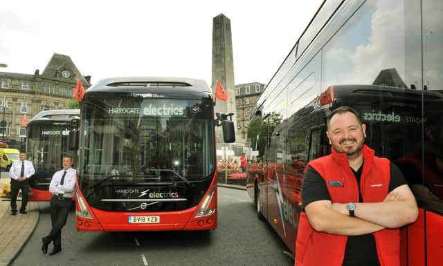 260718  Alex Hornby Chief Executive of Transdev  with some of the new electric buses to be used around Harrogate on show in the twon yesterday(thurs).