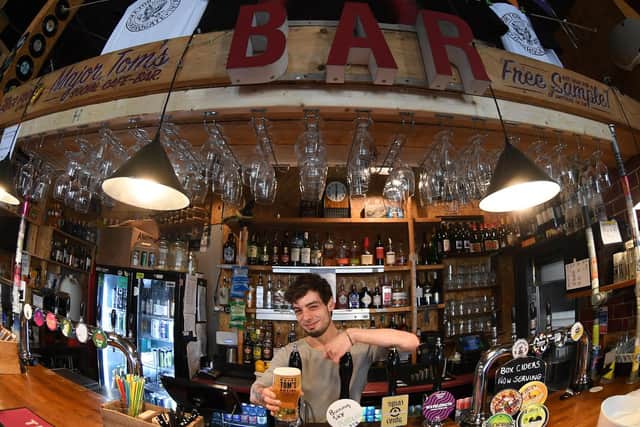 Pictured behind the bar of Major Tom's Social is general Manager Sam Kirbitson. (Picture Gerard Binks)