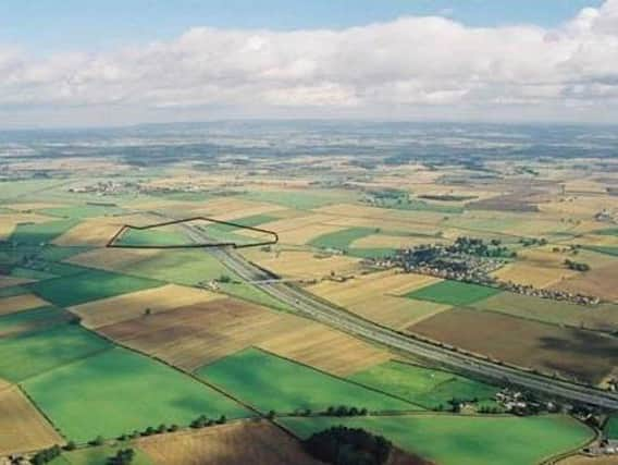 A1M service station: An aerial picture of the site with Kirby Hill to the right.