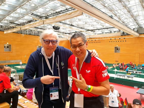 George Chan (right) and his doubles partner Nenad Bach (left) picked up gold in the  men's doubles at the World Parkinson's Table Tennis Championships in Berlin
